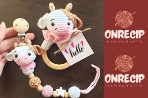 Read more about the article Crochet Cow Pacifier Clip And Rattle Set Amigurumi Free Pattern